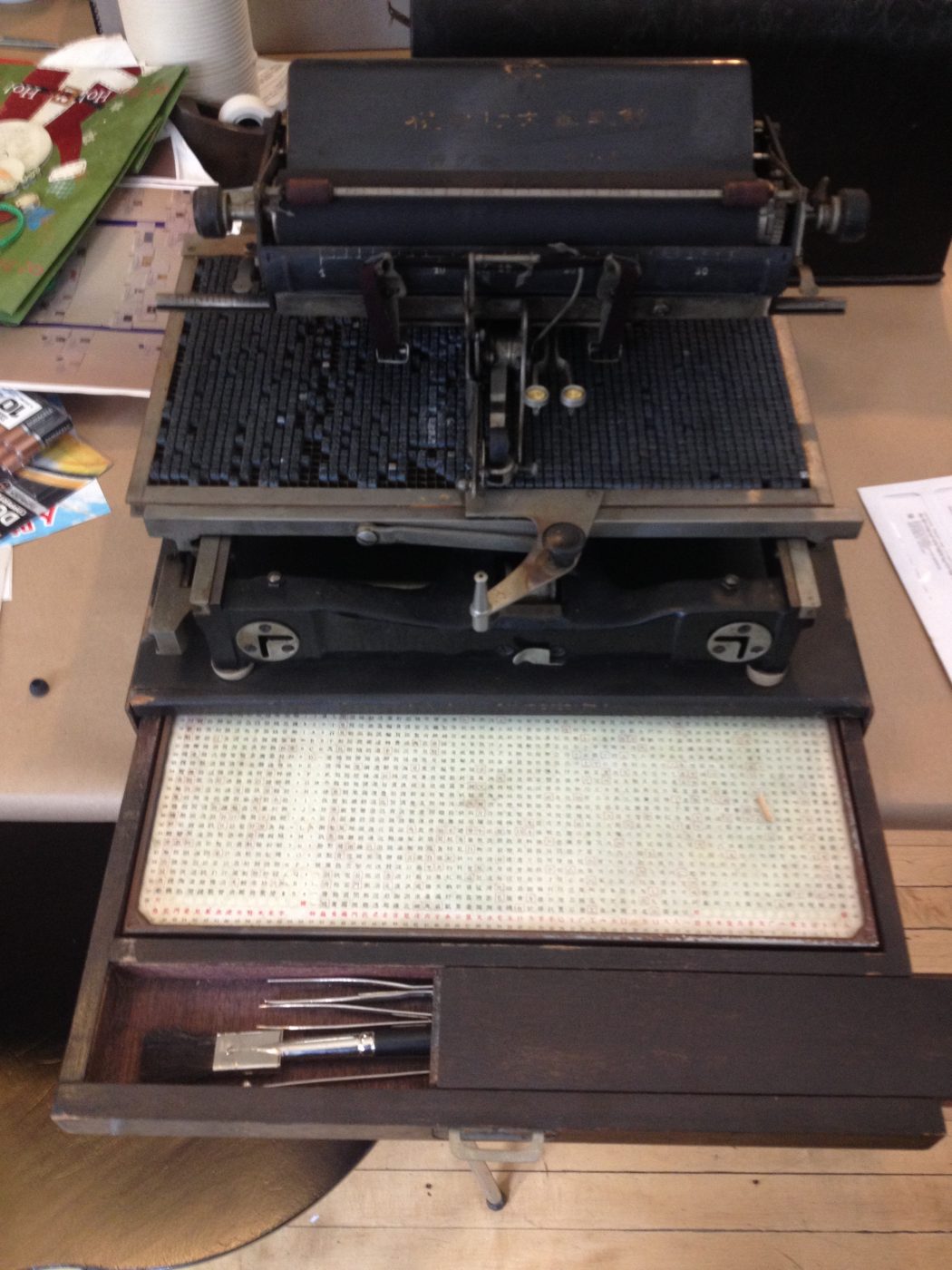 2014.016.001 A Chinese typewriter consisting of hundreds of individual print tiles, pre-fire. Courtesy of David and Lisa Tang--In memory of Ho Poy Sing, Museum of Chinese in America (MOCA) Collection.