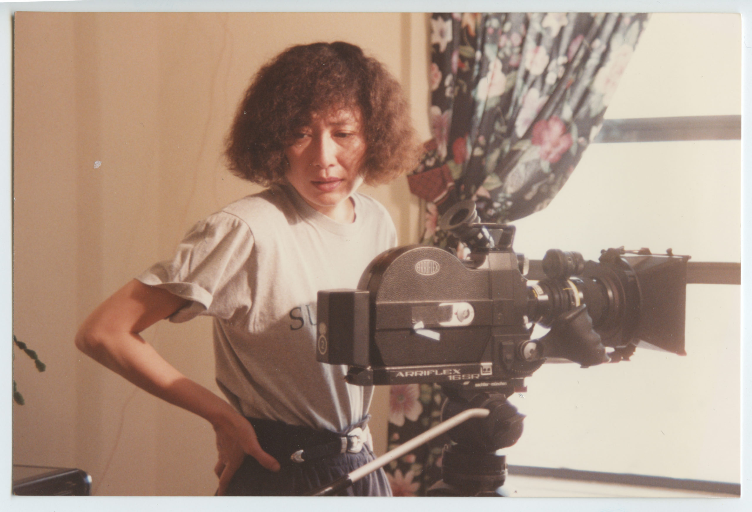 Filmmaker Christine Choy behind the camera. Photograph courtesy of Christine Choy.